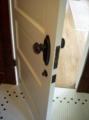 A closer view of the period era door hardware.