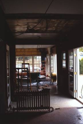Before: Old bathroom has been removed and hallways gutted to make way for the new pantry and back entrance. 
