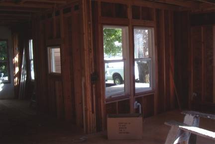 Before: Hot tub area, wet bar and hallway have all been gutted to make room for new kitchen, breakfast nook & china cabinet.