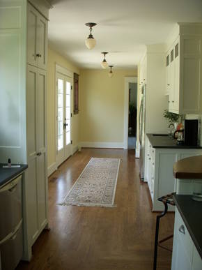 New hallway from kitchen leading to new pantry area & bathroom.