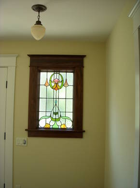 Historical touches were added throughout the home; including stained glass & antique lighting fixtures.