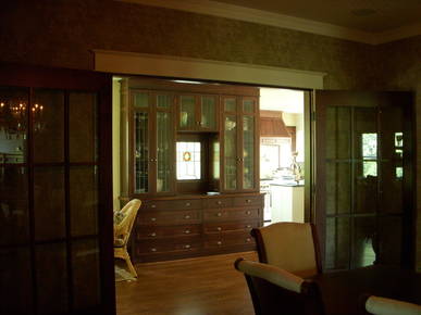 New China Cabinet featuring antique leaded glass doors and stained glass window.