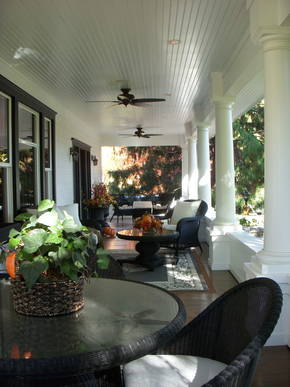 Front porch completely restored with new ceiling, flooring, columns and fans.