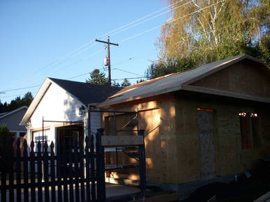 Addition of third bay being added to garage.