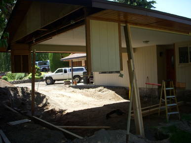 Beginning stages of transforming carport to living room. 