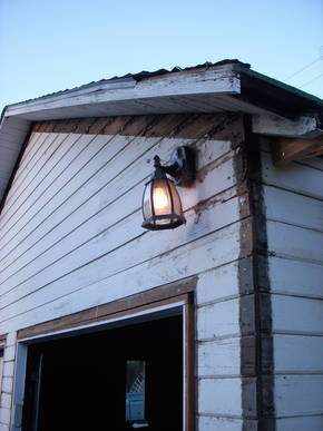 Before: Close up of siding prior to remodel.
