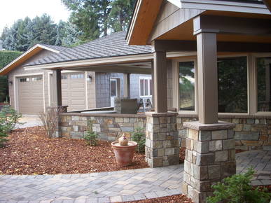 New entry, garage & landscaping in place.