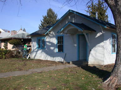 Front - starting restoration- removal of bushes encroching on exterior and interior wall