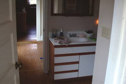 Before: Old Bathroom before this location became a new pantry.