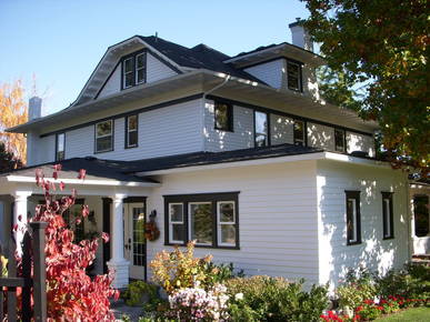 View of some of the new updates including siding & pergola.